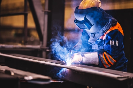 worker-welding-in-a-factory-2022-12-16-11-09-56-utc